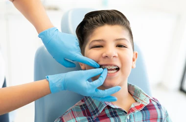 Orthodontist Ellicott City MD Young Boy With Braces A young boy with braces.